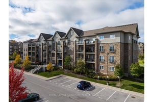 This stylish 3 bedroom, 2 bath corner unit condo is freshly painted throughout, including, Baseboards, ceilings and doors, and features luxury waterproof laminate flooring.