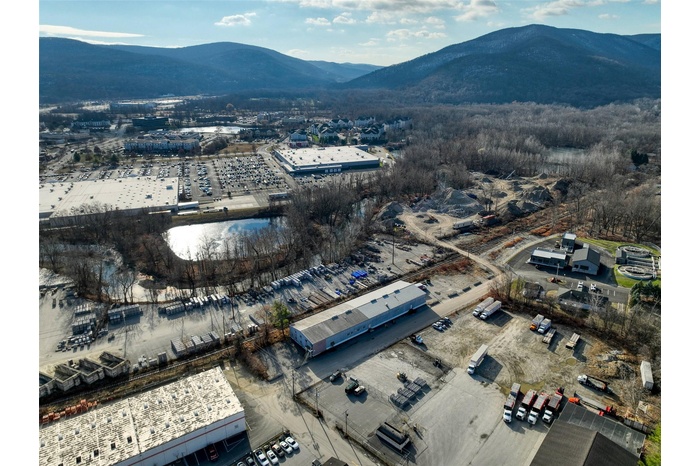 Aerial view featuring a mountain view