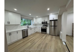 Stunning, newly renovated 2 bedroom ground level side unit in a legal two unit home in one of Oakvilles most desirable neighbourhoods.