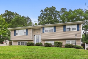 Welcome to this 4 bedroom, 3 full bath raised ranch offering a flexible and spacious layout designed for comfortable everyday living.