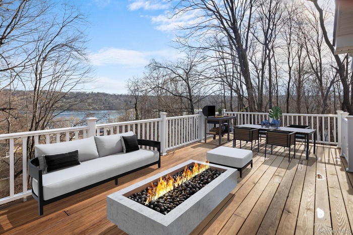 Welcome to the Putnam Lake Community where this renovated cottage with its oversized deck , a perfect place to watch the seasons change, awaits its ne