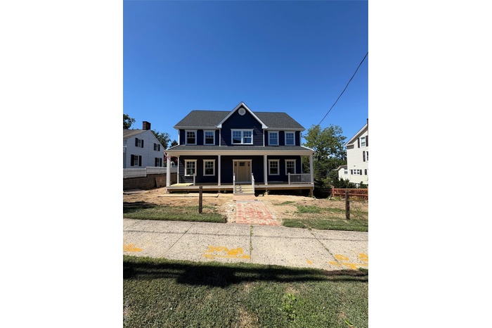 View of front of property with covered porch