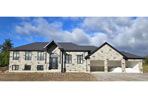 Currently Under Construction Custom built executive stone bungalow by Davenport Homes in the rolling hills of Cavan.