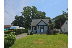 Charming Cape Cod style home with full basement and 1 car detached garage, conveniently located by parks, schools, stores, parkways, eateries, shopping, and other area amenities.
