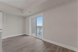 Welcome to Unit 403 at 118 Summersides Blvd a stylish and upgraded 1 bedroom den, 2 bathroom condo in the heart of Fonthill, offering the perfect combination of comfort and ...