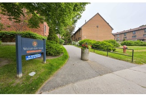 Rare Townhouse With Breathtaking Lake Views on the Bluffs !