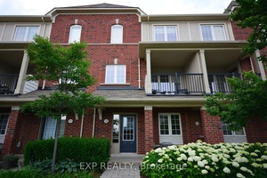 This stunning 3 bedroom, 2 Car garage unit is located steps away from the heart of Oak Park.