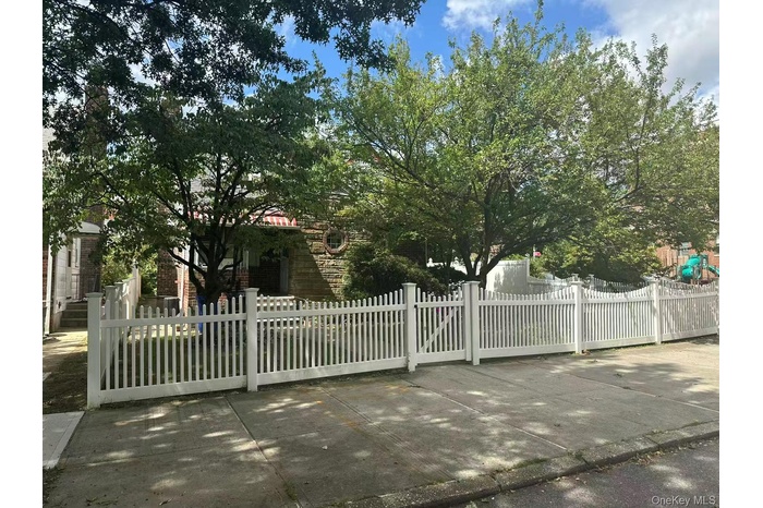 Gate with a fenced front yard