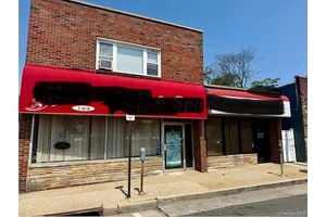 Great Mixed Use Building Close To All, 3 Units Total, Broken Up in Two Commercial Spaces and One 2 Bedroom Apartment, Ample Parking In The Rear, Owner Is Currently Using ...