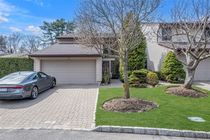 Welcome to this beautifully renovated Chadwick end unit in the Maple Run Gated Community.