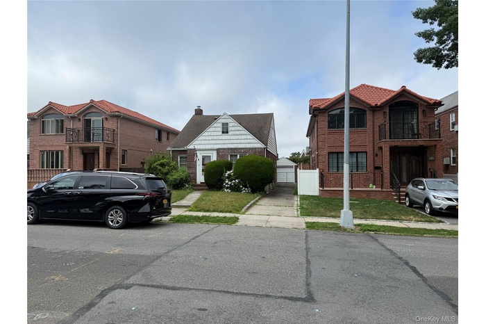 Townhome / multi-family property with brick siding