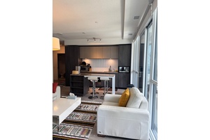 Corner Unit ! Offering Panoramic View from Master Bedroom of Lake and Waterfront, This Perfectly Laid Out 2 Bed Condo Offers Unprecedented Sunlight And Living Space.