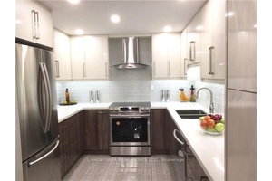 Upgraded Kitchen Cabinet With Recessed Lighting amp ; Quartz Counter Top, Stainless Steel Appliances, Eat In Area.