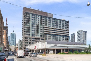Welcome to this spacious and smartly designed large 1 1 bedroom, 2 bath condo in the heart of Toronto.