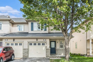 Bright and spacious open concept 3 bedroom, 4 bath end unit townhouse with a rear deck fully fences yard.