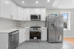 3210 Paulding Avenue is a newly renovated, turn key move in ready 20x47 built brick 2 family spanning over 1, 800 sq ft of living space.