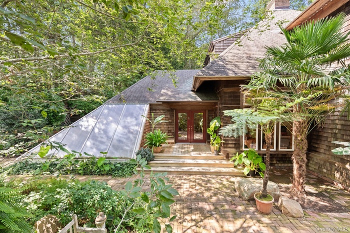 Front of the house with attached greenhouse
