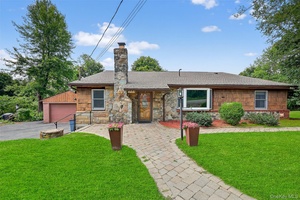 Discover this spacious 4 bedroom home with a unique and inviting layout cradled on a park like and private corner lot in the desirable Lake Carmel community.