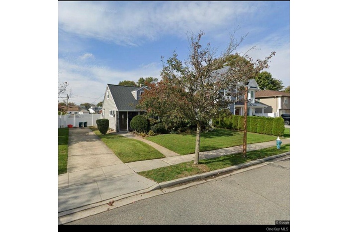 View of front of property with driveway