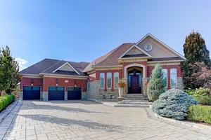 This stunning luxury bungalow is located on a peaceful street in the prestigious Vellore Village Community, offering over 7, 000 sq.