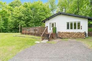 Top 5 Reasons You Will Love This Home 1 Just minutes from the shimmering shores of Georgian Bay, this charming home invites you to embrace a lifestyle of weekend escapes ...