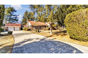 This charming brick house offers ample space and with a few updates it would be a perfect forever home.