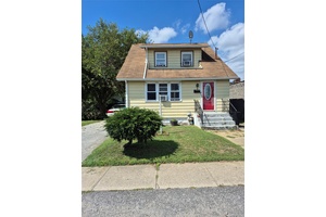 Prime Location In The Heart Of Lynbrook Featuring Entry Foyer, Large Enclosed Porch, Large Living Room, Formal Dining Room, Kitchen With Gas Cooking, Laundry Area In Rear, 2nd Floor Features ...