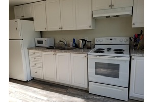 Legal duplex 2 Bed, 1 Bath lower unit with private entrance.