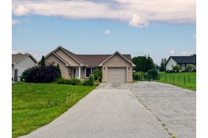 This well designed and newly painted bungalow offers a convenient single level living in the quiet and peaceful town of Tara.