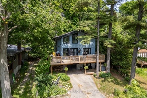 Welcome to your year round retreat in the exclusive, private community of Pine Point, nestled along the shores of Lake Scugog.