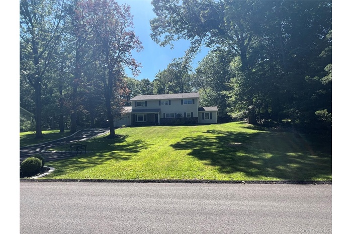 View of front of house featuring a front lawn