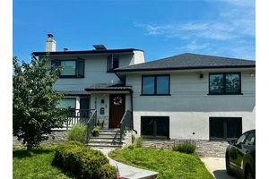 Large 4 Bedroom, 4 Bath, Stucco Siding, Inground Pool h surround decking and Patio.