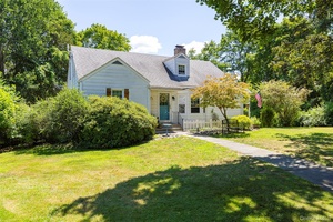 Nestled on a quiet street in the desirable Arlington School District, this charming 5 bedroom, 2 bathroom Cape Cod offers over 2, 200 square feet of thoughtfully designed living space.