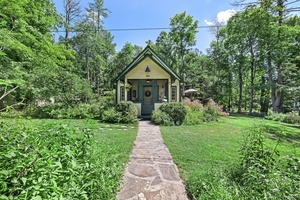 Nestled on a coveted, peaceful country road situated between two amazing natural features, sits your new investment or vacation home.