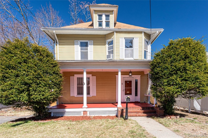 Traditional style home with covered porch