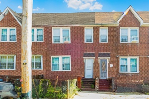 Discover the charm of Bronxwood living in this delightful two family brick house, ideal for both investors and those seeking a spacious home.