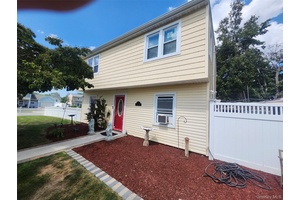 Spacious 6 bedroom, 2 bath Levittown colonial, offering ample space, modern updates, and an oversized lot.
