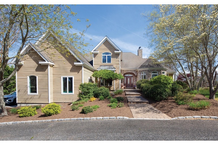 Traditional home featuring a chimney