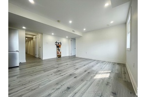 Bright and Spacious 2 Bedroom Den, 1 Bathroom Walkout Basement Unit in the Desirable Queensville Community.