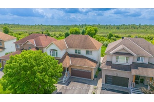 Discover this stunning 4 1 bedroom home with a spectacular backyard retreat, nestled on a quiet street in sought after Bradley Estates.