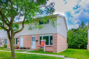 Great opportunity to own this beautifully finished two story END UNIT Town House.