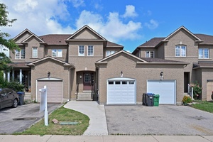 Welcome to a home where modern design meets comfortable living at 132 Earth Star Trail in Brampton !