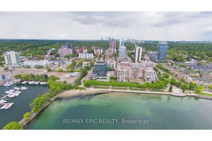 Spacious north east facing corner unit in a boutique condo at the heart of Port Credit Village.