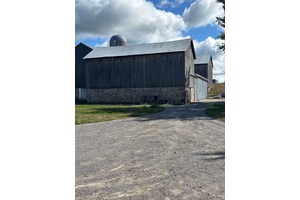 This exceptional 97 acre farm property offers a unique blend of rural charm and modern convenience.