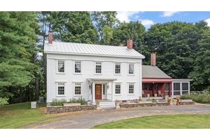 Originally built in 1836, this beautifully renovated Federal style farmhouse is rich with history and character, once part of the Underground Railroad and also used as a Quaker meeting hall.