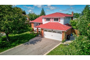 Perfectly situated on a quiet, family friendly street lined with mature trees, this updated 4 bedroom, 2.