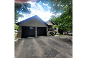 Custom Built Stucco And Stone Home With Walk Out.