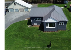 This beautiful home in the scenic community of Loring is a MUST SEE !
