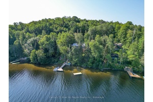 Discover the beauty of lakefront living with this 4 bedroom home perfectly situated on scenic Trout Lake.