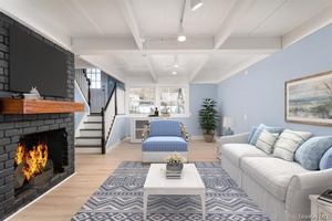 Welcome Home to this beautifully renovated Hi Ranch nestled in the heart of Stony Brook.